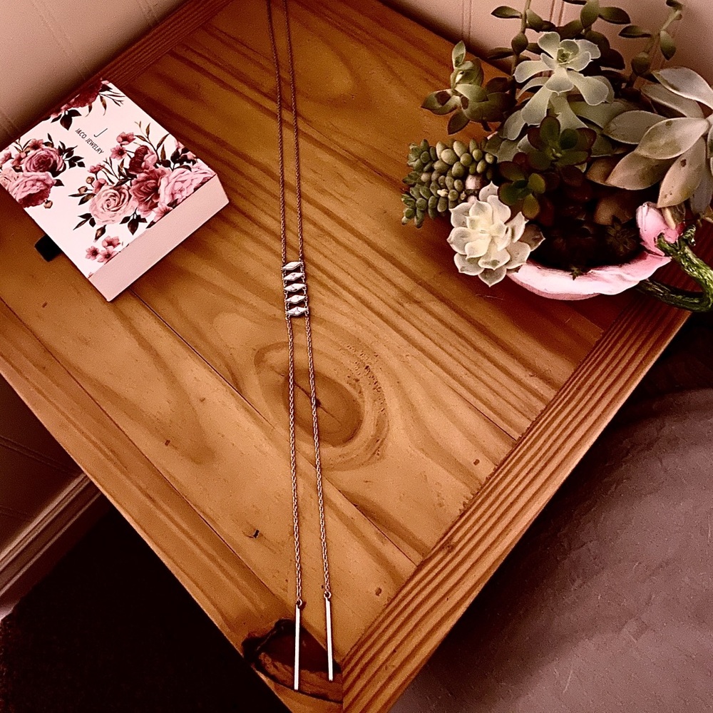 Long horizontal diamond shape necklace